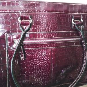 I am selling 3 designer ladys handbags